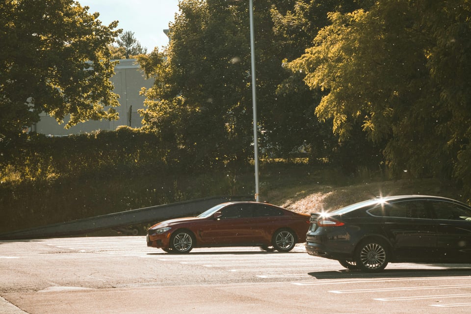 Cars in a nearly empty parking lot