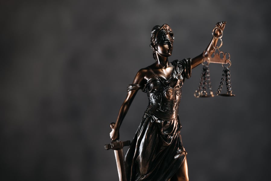 Statue of Lady Justice holding scales