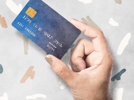 hand holding credit card