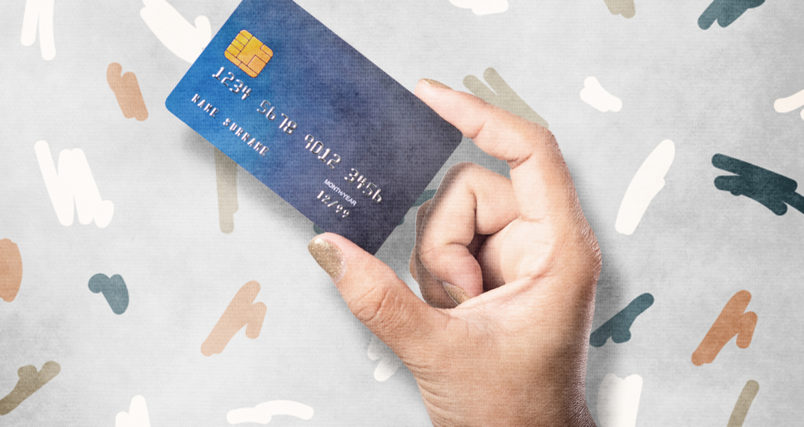 hand holding credit card