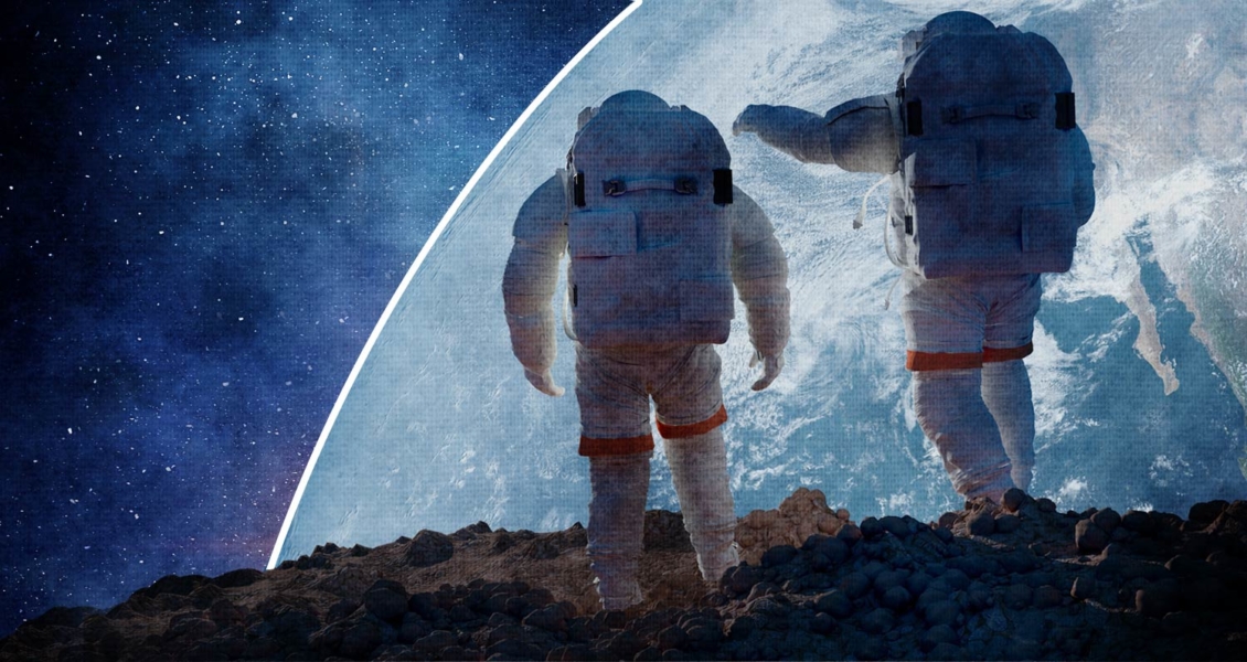 astronauts in space pointing at earth