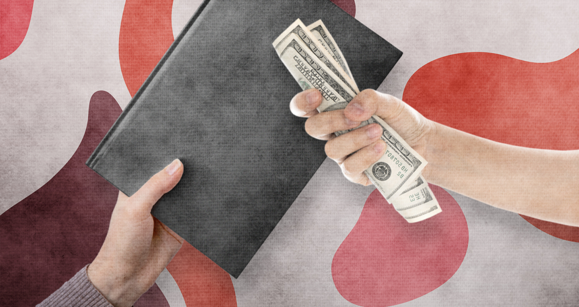 hands exchanging book for money