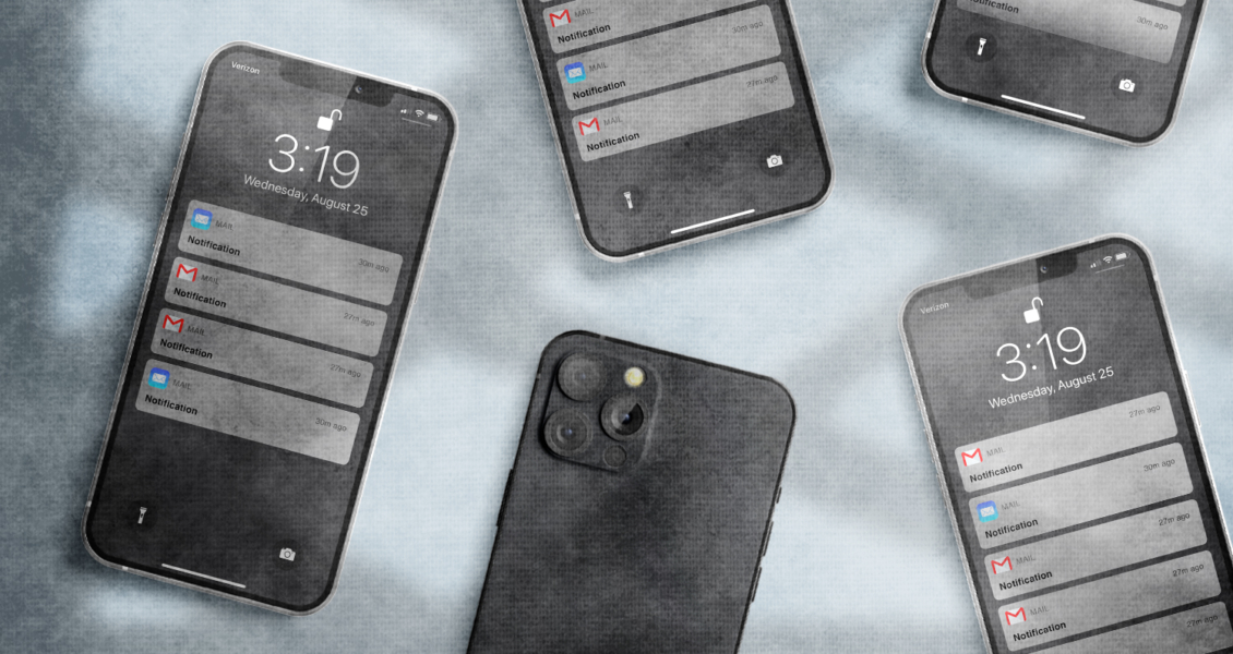 Five smartphones displaying notifications and the time 3:19 on their screens are scattered on a textured surface.