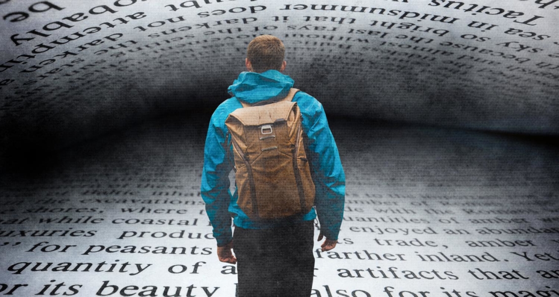 A person in a blue jacket with a brown backpack stands facing a large, curved display of magnified text.