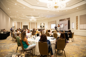 Valerie speaking to room