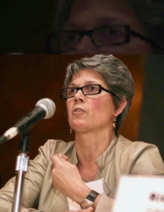 Patti speaking into microphone