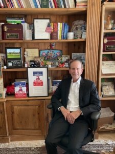 Dr. Wish with framed book