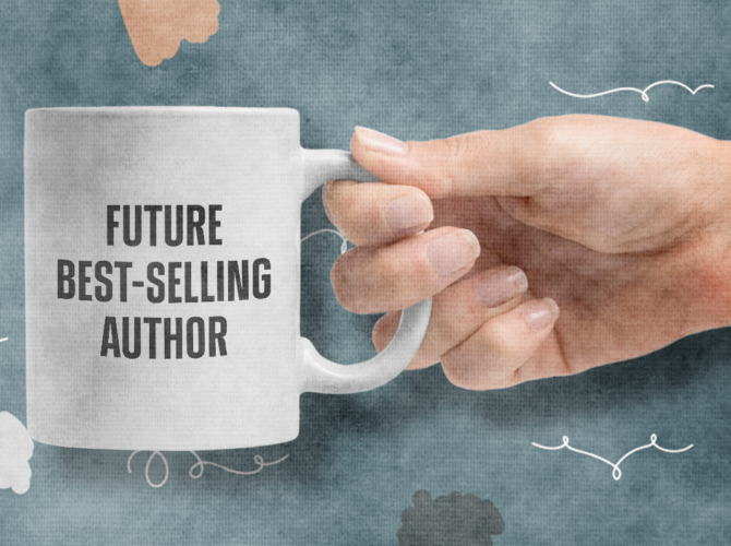 hand holding bestselling author mug