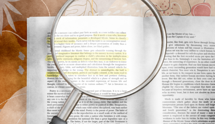 feature image magnifying glass over book with highlighted text