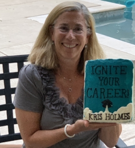 Kris Holmes with book cake