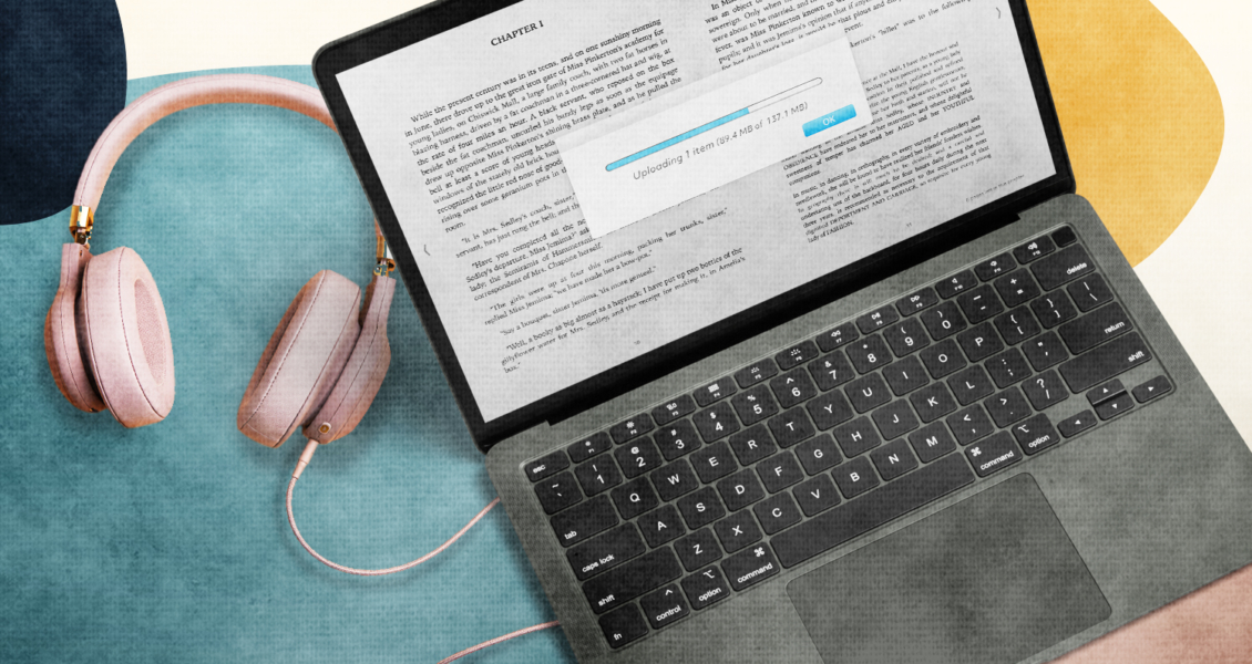 book upload progress on laptop with headphones